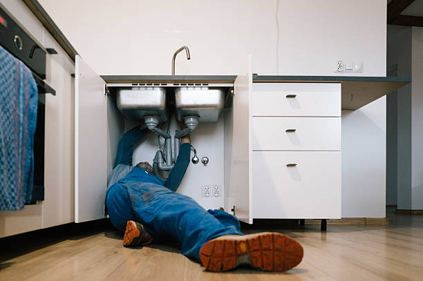 Professional Emergency Plumber technician working in Goshen, IN